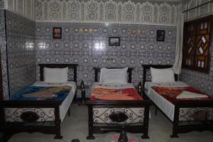 Postel nebo postele na pokoji v ubytování Riad Marrakech Medina