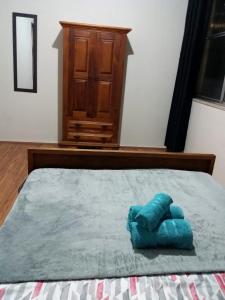 Apartamento aconchegante no centro de Teresópolis ( várzea) 객실 침대