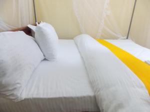 Cloud9 Suites客房内的一张或多张床位