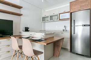 مطبخ أو مطبخ صغير في Apartamentos completos ao lado da UFSC - NAVONA