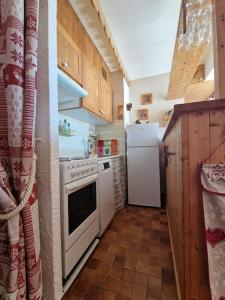 Kuchyňa alebo kuchynka v ubytovaní Appartement - Vue Mont-Blanc