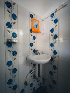 Ett badrum på BENIEL HOMESTAY