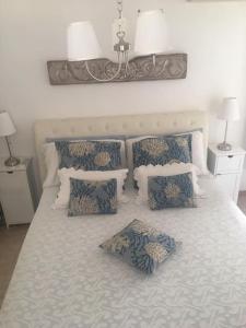 Ένα ή περισσότερα κρεβάτια σε δωμάτιο στο Casa Sorriso