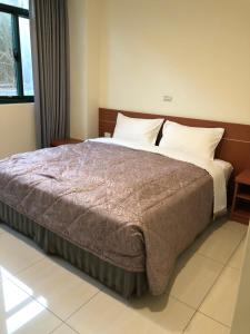 Letto o letti in una camera di Lohas Seaview B&B