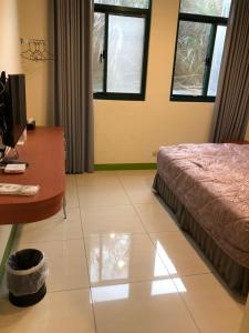 Letto o letti in una camera di Lohas Seaview B&B