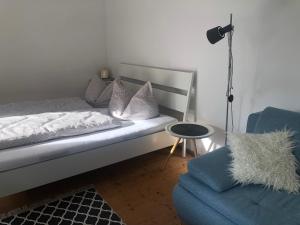 Postel nebo postele na pokoji v ubytování 1 ZI Appartement Zauberwald