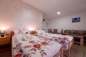 Letto o letti in una camera di Apartmani Rvović