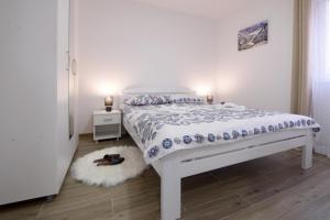 Letto o letti in una camera di Apartmani Rvović