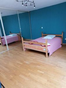 Posteľ alebo postele v izbe v ubytovaní ST MALON SUR MEL