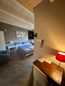 Postel nebo postele na pokoji v ubytování Hotel Bella Napoli ristorante & spa