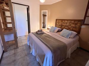 Cama ou camas em um quarto em Pousada Paloma