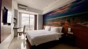 Letto o letti in una camera di Ascent Premiere Hotel and Convention