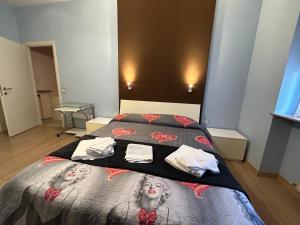 A bed or beds in a room at Residenza Ancora - Centro - Zona Ospedale