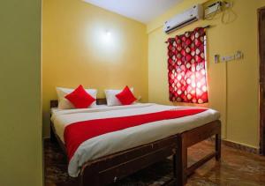 Postel nebo postele na pokoji v ubytování Ocean Way Guest House
