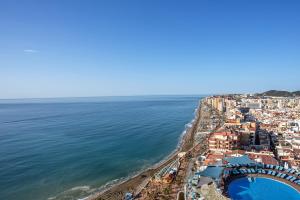 an aerial view of a city and the ocean at Hotel El Puerto by Pierre Vacances in Fuengirola