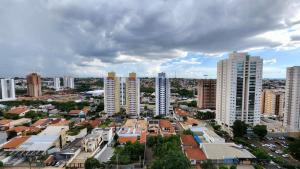 a city with many tall buildings and a city at Estúdio Ultra Luxo com Vista Panorâmica in Campo Grande