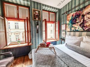 Posteľ alebo postele v izbe v ubytovaní Divná pani Luxury Gallery Rooms