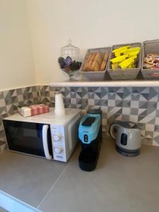 A kitchen or kitchenette at Monolocale V.M 0.23