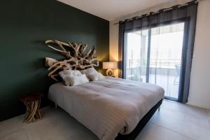 Łóżko lub łóżka w pokoju w obiekcie Stanatura Appt 2 chambres vue panoramique #INDENO