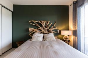 Łóżko lub łóżka w pokoju w obiekcie Stanatura Appt 2 chambres vue panoramique #INDENO