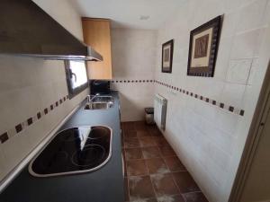 Η κουζίνα ή μικρή κουζίνα στο Apartamento en Las margas Golf +15 φωτογραφίες