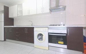 Kuchyň nebo kuchyňský kout v ubytování Apartamento VISTABELLA