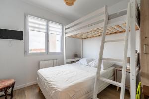 Posteľ alebo postele v izbe v ubytovaní Charmant appartement à 500m de la plage