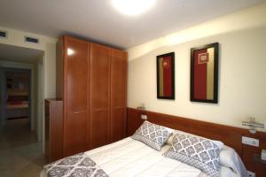 Postel nebo postele na pokoji v ubytování Apartamento Bellavista 114 + 21 fotografií