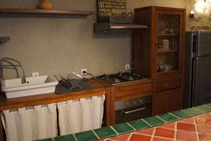 Η κουζίνα ή μικρή κουζίνα στο Les Pierres Blondes