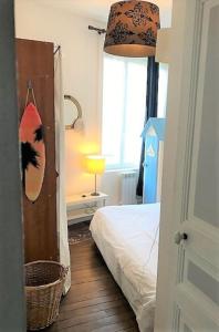 Postel nebo postele na pokoji v ubytování Oleta