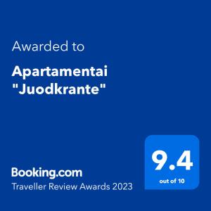 Un écran bleu avec le texte attribué au jucknife apartmentatal dans l'établissement Apartamentai "Juodkrante", à Juodkrantė