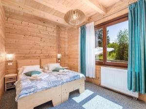 Posteľ alebo postele v izbe v ubytovaní Apartments Plitvice forest