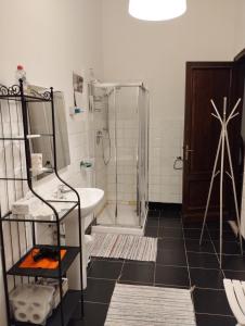a bathroom with a shower and a sink at Residenza dell'Orto in Chiavari