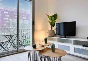 Telewizja i/lub zestaw kina domowego w obiekcie L'escapade - Centre Ville - Parking - Balcon