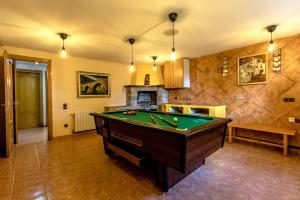 a large room with a pool table in it at Catalunya Casas Stunning Villa with private pool 33 km to Barcelona in Senmanat