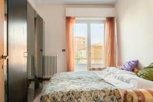 Ένα ή περισσότερα κρεβάτια σε δωμάτιο στο Chic Italian Escape - Casa Vacanze Lorusso