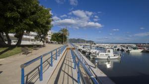 a bunch of boats are docked in a marina at Vives Ref 9002 in Cala Bona