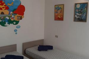 A bed or beds in a room at House Marika