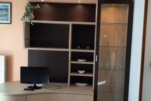 A television and/or entertainment centre at House Marika