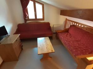 Appartement Valfréjus, 6 pièces, 12 personnes - FR-1-265-179にあるシーティングエリア