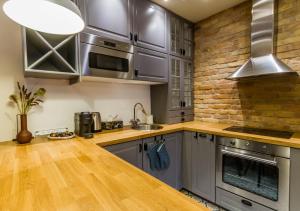 A kitchen or kitchenette at The Museum Living Budapest