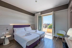 Postel nebo postele na pokoji v ubytování Hotel Imperial ***S + 37 fotografií