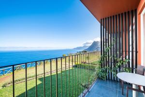 a balcony with a view of the ocean at Hotel Quinta Do Furao in Santana