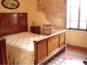 A bed or beds in a room at Ary's House -Profumo di salmastro
