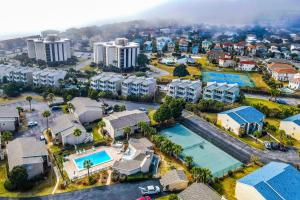 an aerial view of a city with houses and a tennis court at Chateau La Mer 2A in Destin