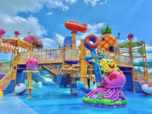 a water park with a water slide at Nickelodeon Hotels & Resorts Riviera Maya All Inclusive in Puerto Morelos