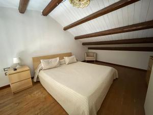 Postel nebo postele na pokoji v ubytování Baglio Judica Apartments