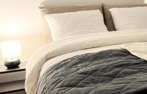 Tammer Huoneistot - City Suite 4 - Perfect Location & Great Amenities tesisinde bir odada yatak veya yataklar