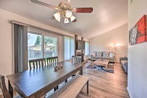 a dining room with a table and a ceiling fan at Family-Friendly Oceanside Home 5 Mi to Beach in Oceanside