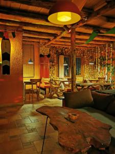 Un restaurant u otro lugar para comer en Šum Apartmani - Stara planina
